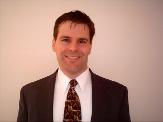 Article-era portrait of John Hollner
